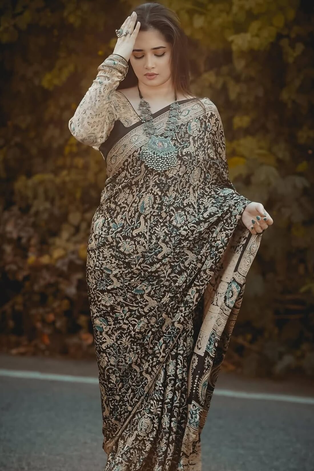 Beige and Black Crape Silk Saree - draped look