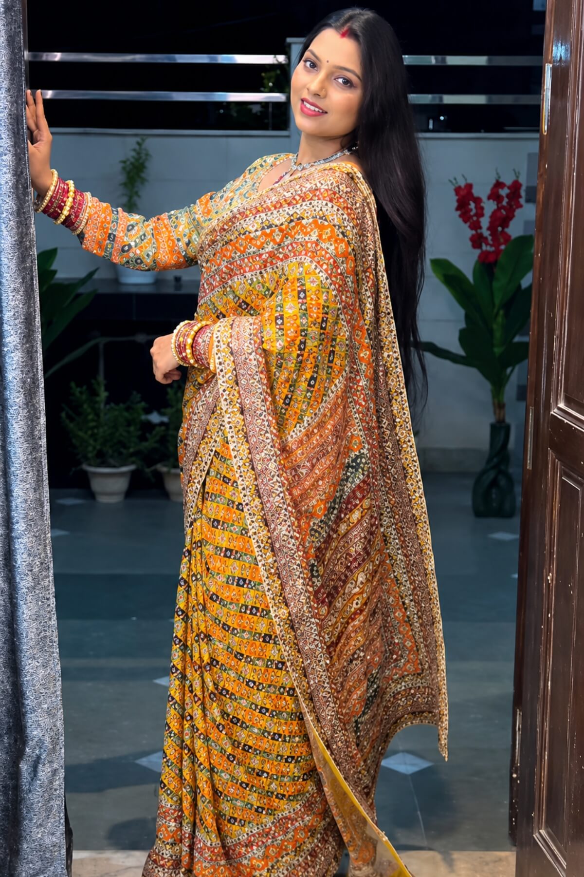 Yellow mirror work saree with unstitched blouse piece