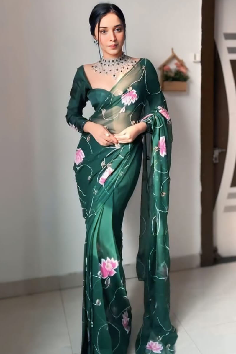 Dark green organza saree drape and pleats close up